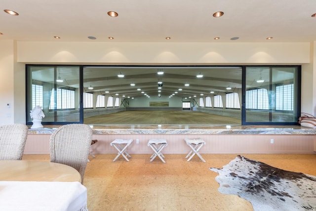 interior space with billiards, lofted ceiling, and a healthy amount of sunlight