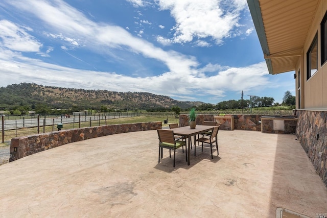 view of patio featuring a mountain view