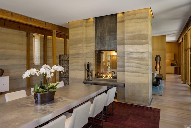 2181 N 3rd Ave, Napa, CA 94558 - dining area with wooden walls and light hardwood / wood-style floors