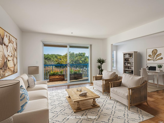 living room featuring light parquet floors