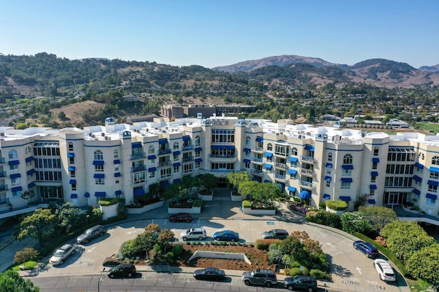 view of building exterior featuring a mountain view