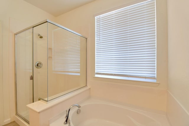 bathroom with plus walk in shower