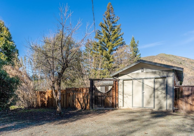 garage featuring a mountain view