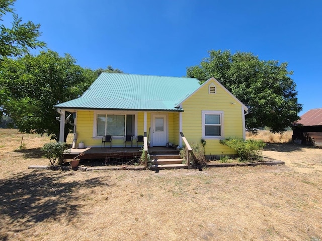 bungalow-style house with covered porch