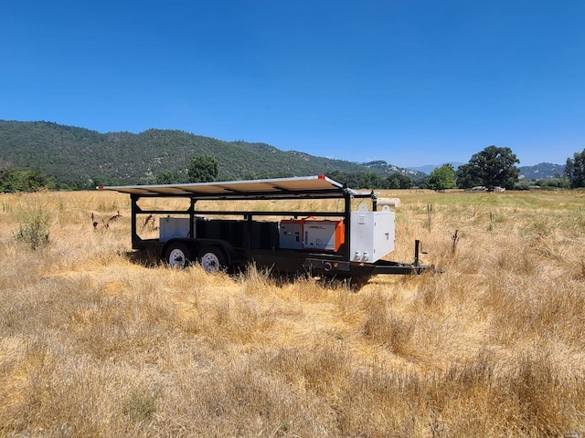 exterior space with a rural view