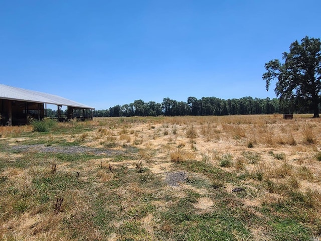 exterior space with a rural view