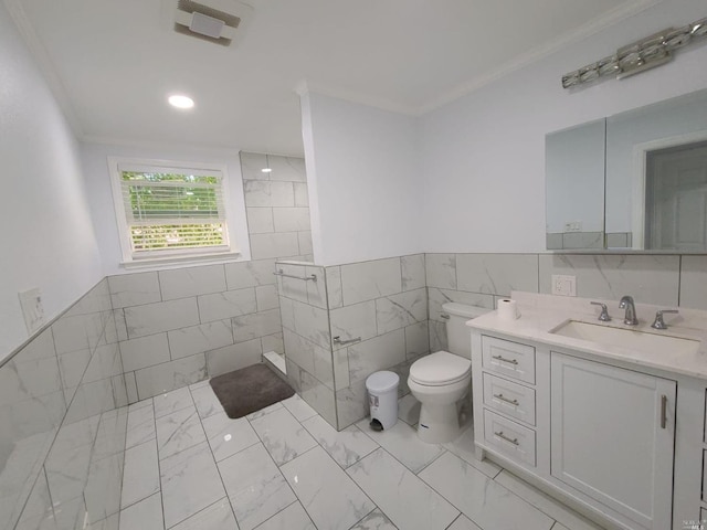 bathroom featuring vanity, tile flooring, toilet, and tile walls