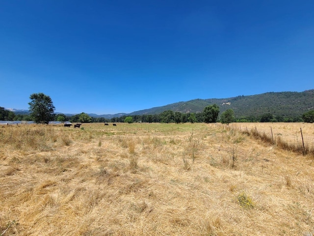 view of mountain feature featuring a rural view