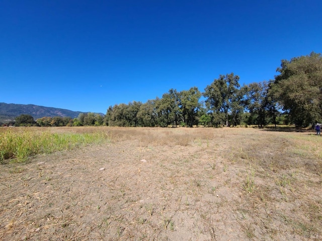 exterior space with a rural view