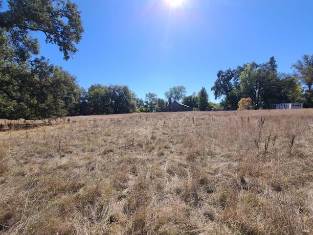 view of landscape with a rural view