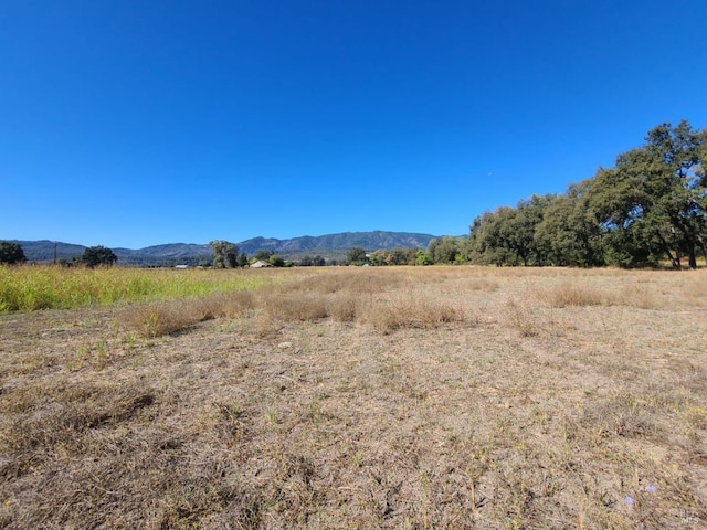 view of mountain feature featuring a rural view