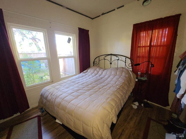 bedroom with wood-type flooring