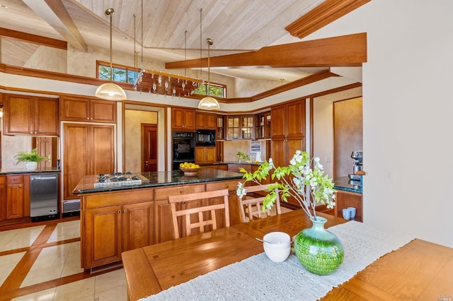 kitchen featuring high vaulted ceiling, light tile floors, decorative light fixtures, and black appliances