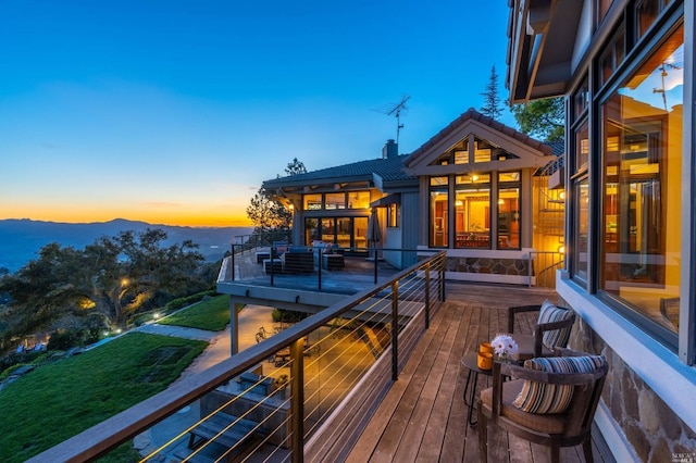 view of deck at dusk