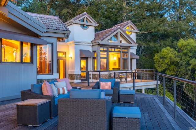 wooden terrace featuring outdoor lounge area