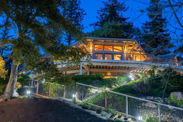 view of back house at night