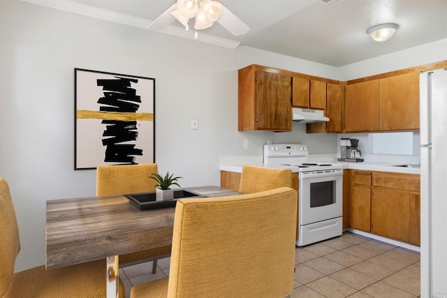 2010 Pioneer Way, Santa Rosa, CA 95403 - kitchen featuring ceiling fan, white appliances, and light tile flooring
