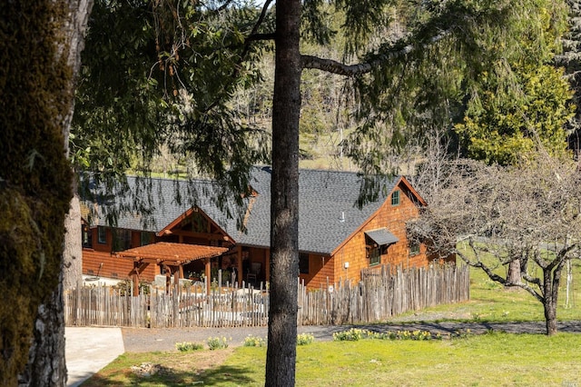 31650 Sherwood Rd, Willits, CA 95490 - exterior space with a front lawn, a shingled roof, and fence private yard