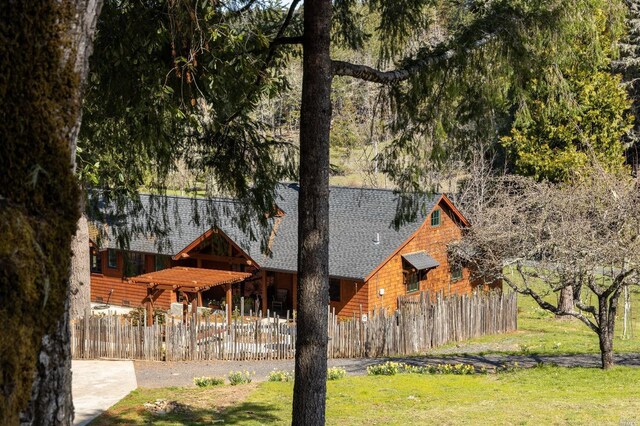 31650 Sherwood Rd, Willits, CA 95490 - exterior space with a front lawn, a shingled roof, and fence private yard