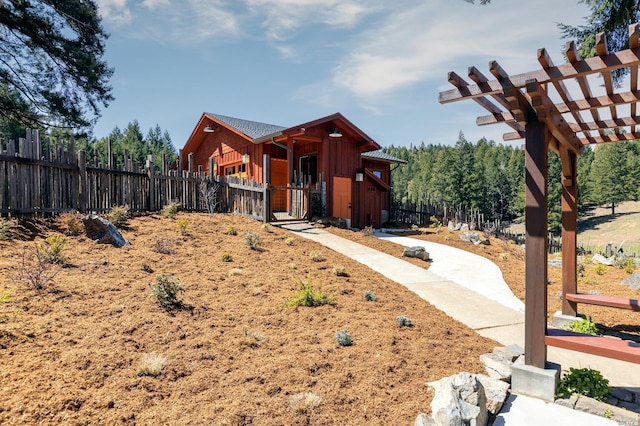 31650 Sherwood Rd, Willits, CA 95490 - view of front of property with a pergola, board and batten siding, and fence private yard