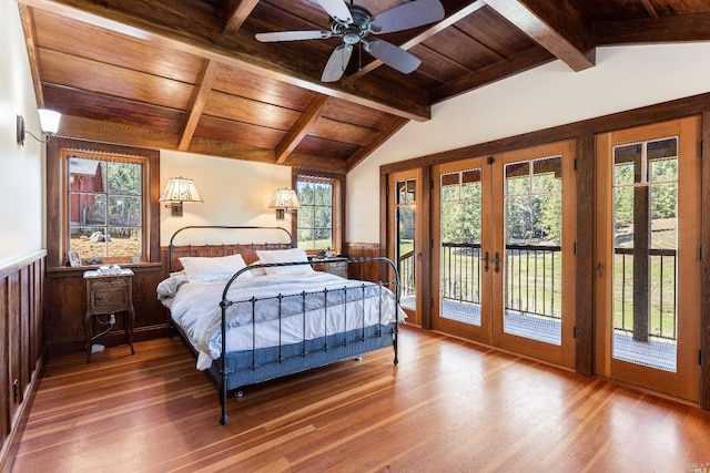 31650 Sherwood Rd, Willits, CA 95490 - bedroom with wood ceiling, french doors, vaulted ceiling with beams, and a wainscoted wall