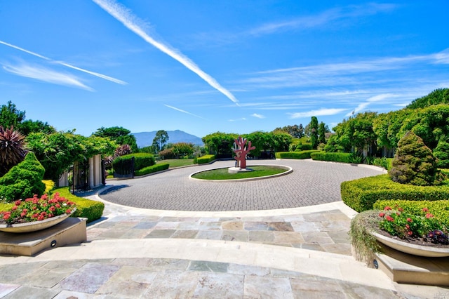 surrounding community featuring a mountain view