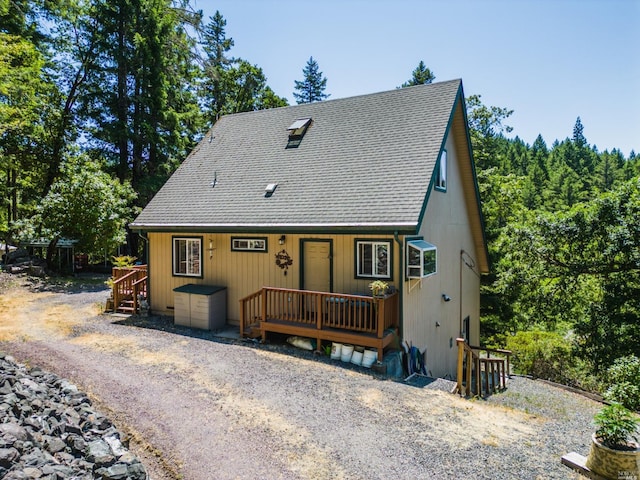 view of front of property featuring a wooden deck