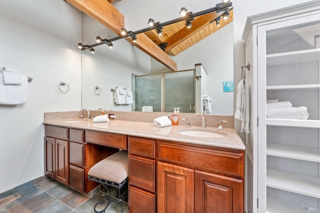 bathroom with tile flooring, large vanity, dual sinks, and lofted ceiling with beams