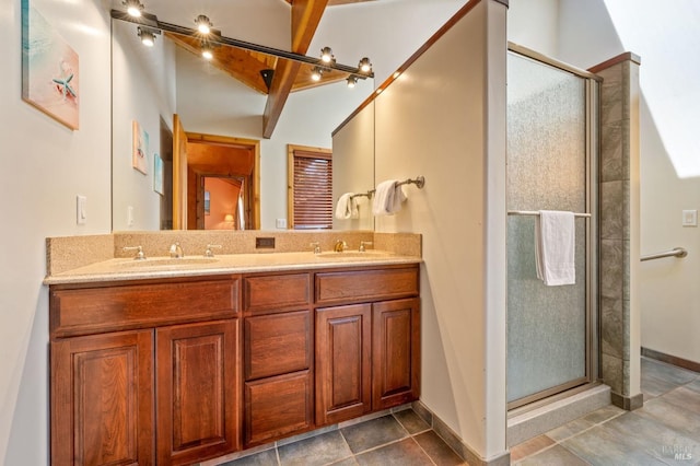 bathroom with a shower with door, tile flooring, and dual vanity