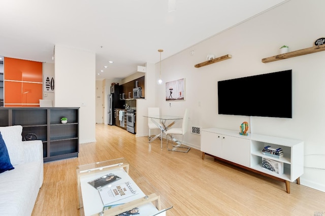 living room with light wood-type flooring