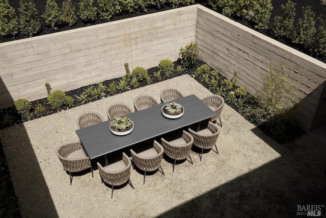 view of patio / terrace featuring outdoor dining area and a fenced backyard