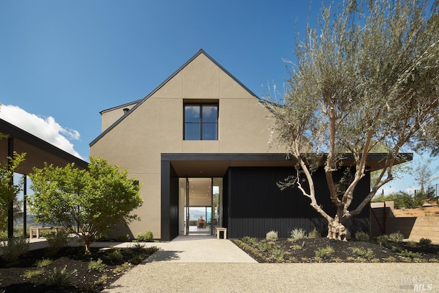 exterior space featuring stucco siding