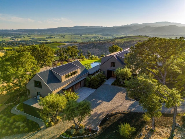 bird's eye view with a mountain view