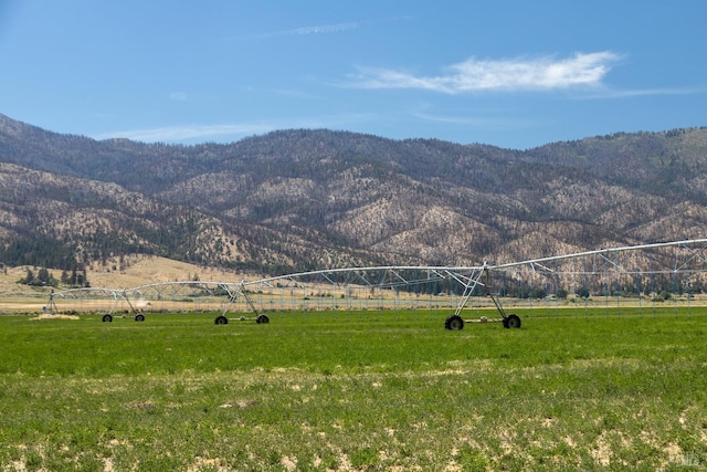 view of mountain feature featuring a rural view