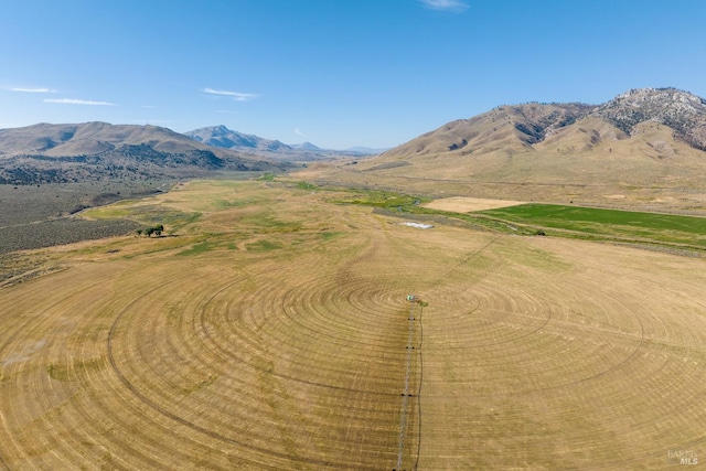 mountain view featuring a rural view