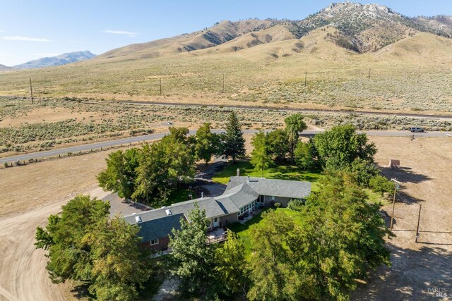 bird's eye view with a mountain view and a rural view