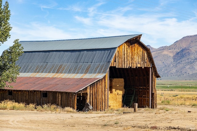 view of shed / structure featuring a mountain view