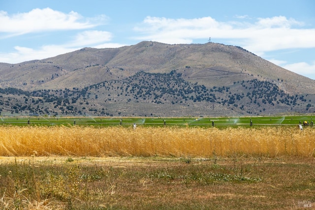 view of mountain feature with a rural view