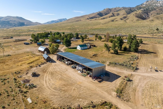 bird's eye view with a mountain view and a rural view