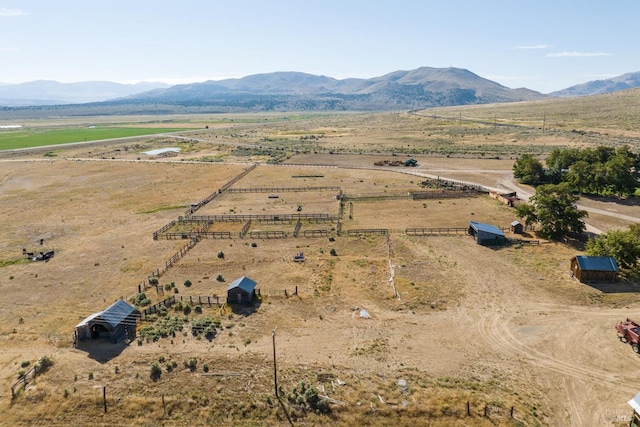 bird's eye view with a mountain view and a rural view