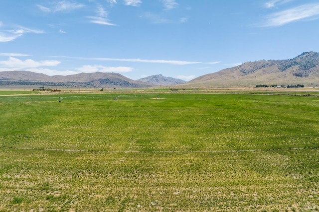 view of mountain feature with a rural view