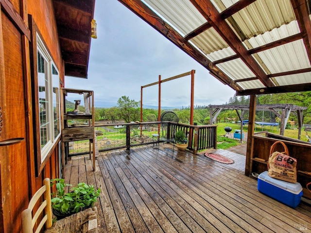 wooden terrace featuring a pergola