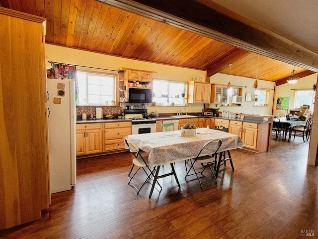 kitchen with white appliances, sink, hanging light fixtures, dark hardwood / wood-style floors, and light brown cabinetry