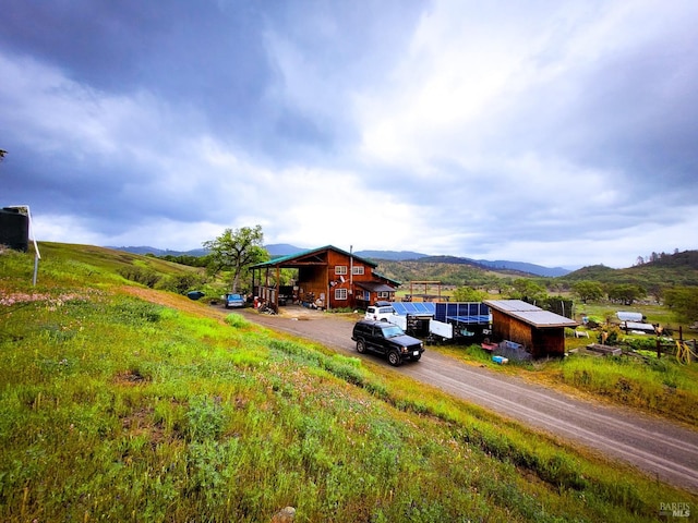 exterior space with a mountain view