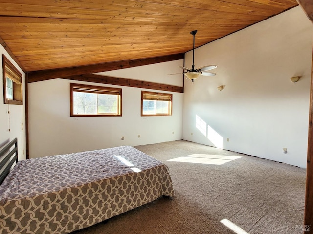 unfurnished bedroom with carpet flooring, ceiling fan, wooden ceiling, and lofted ceiling