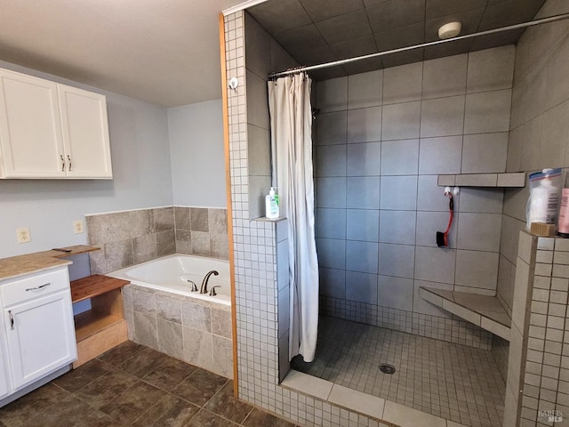 bathroom featuring separate shower and tub, tile patterned flooring, and vanity