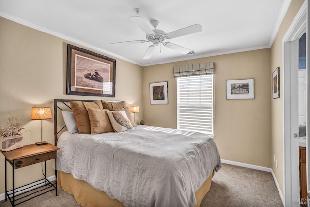 carpeted bedroom featuring ceiling fan and crown molding