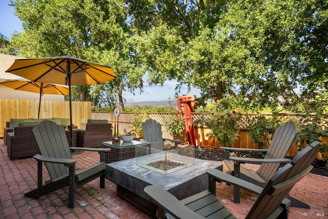 view of terrace featuring a fire pit