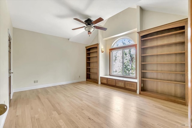 unfurnished living room with light wood-type flooring, ceiling fan, and lofted ceiling