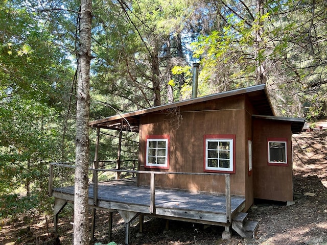 view of home's exterior with a deck